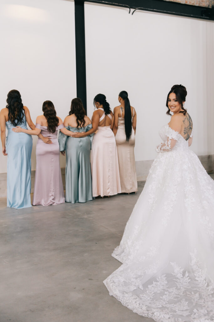 bride trying on a designer gown in a private suite