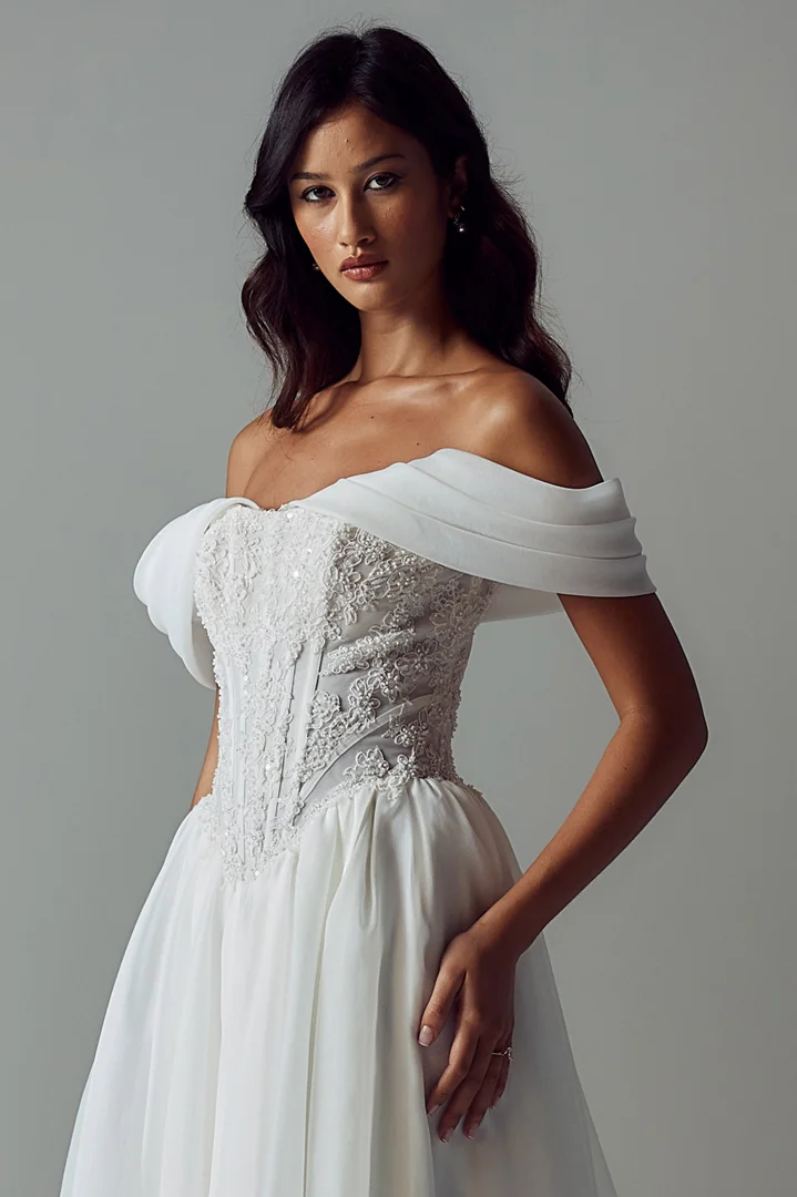 Ruched corset bodice and removable off-the-shoulder straps on the Keala gown