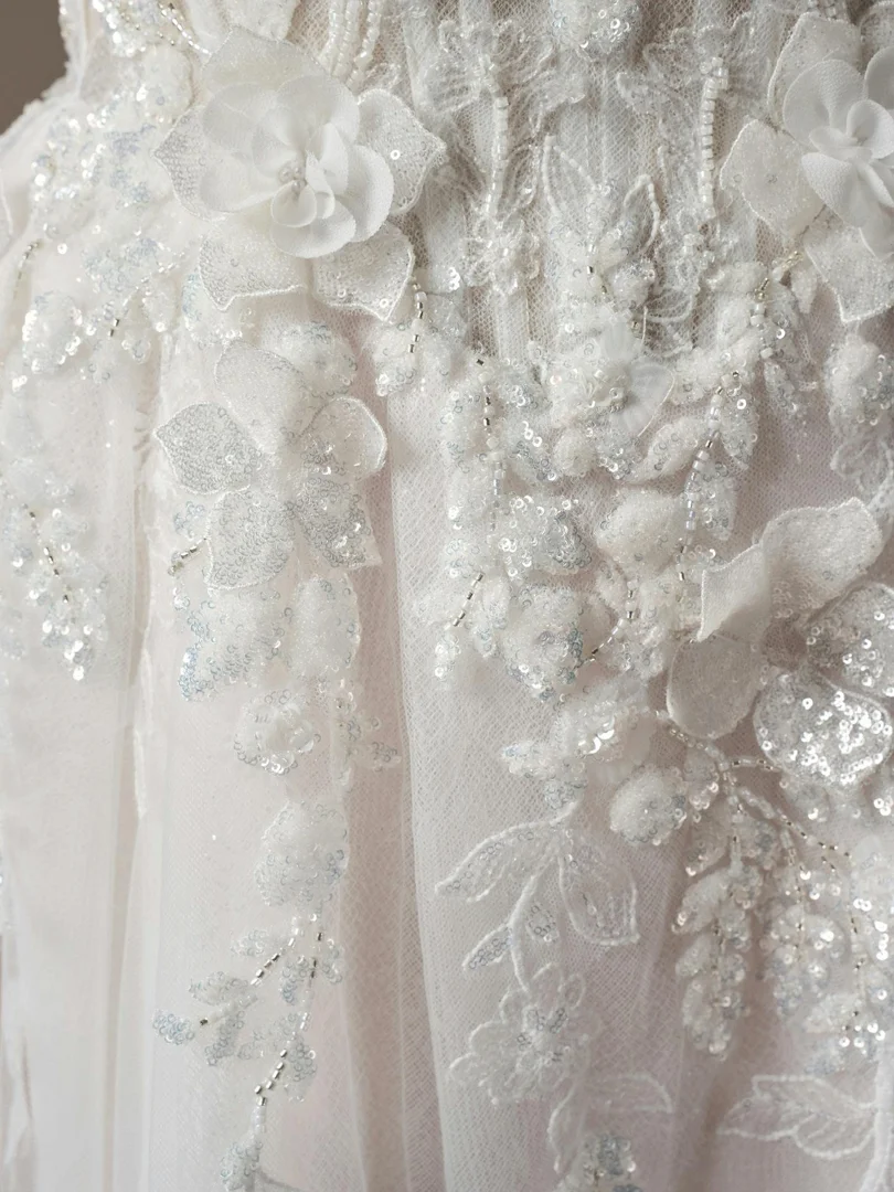 intricate lace and netting on a Willowby dress